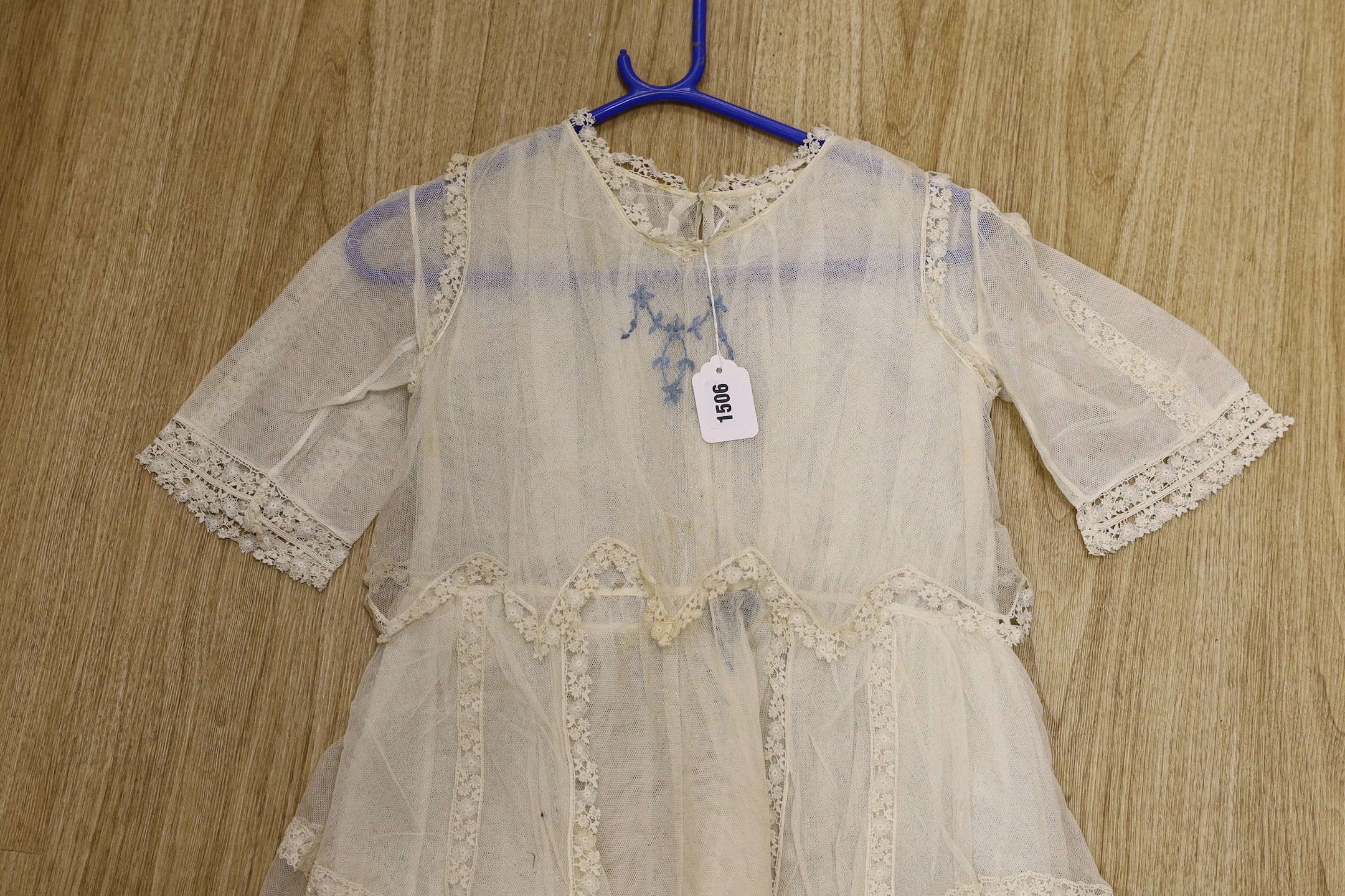 A young girl's 1920's-30's cream net and lace trimmed confirmation dress